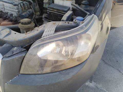 Foto 1ª: Faro Izquierdo Chevrolet Aveo 86CV 63KW (2011)