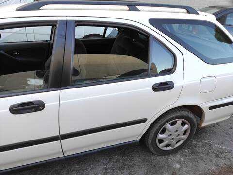 Foto 1ª: Puerta Trasera Izquierda Honda Civic D15Z8 (1999)