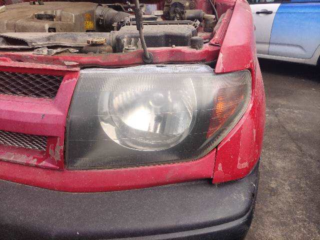 Foto 1ª: Faro Izquierdo Mitsubishi Montero 1.8 GDI 4X4 [4G93] (2000)