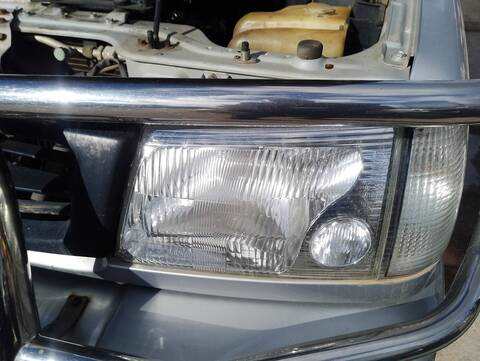 Foto 1ª: Faro Izquierdo Mitsubishi Galloper 2.5 TD 5-PTAS.) 99CV 73KW [D4BH] (2000)
