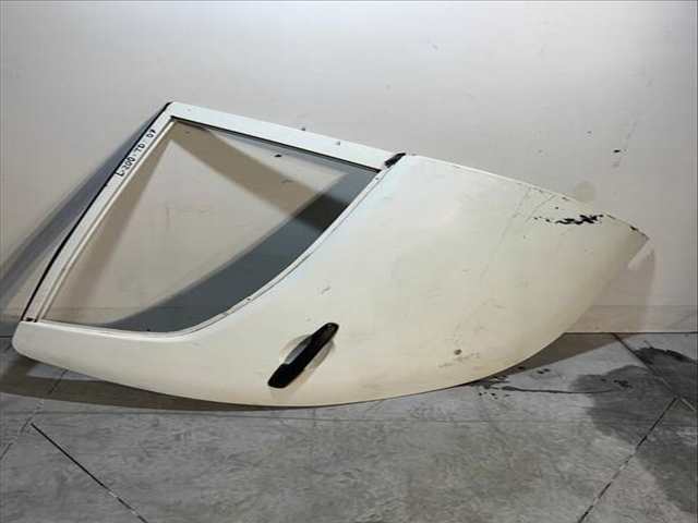 Puerta Trasera Derecha Mitsubishi L200 2.5 DI-D CAT 136CV 100KW
