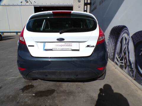 Foto 1ª: Paragolpes Trasero Ford Fiesta SNJB (2010)