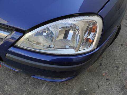 Foto 1ª: Faro Izquierdo Opel Corsa Z12XE (2004)
