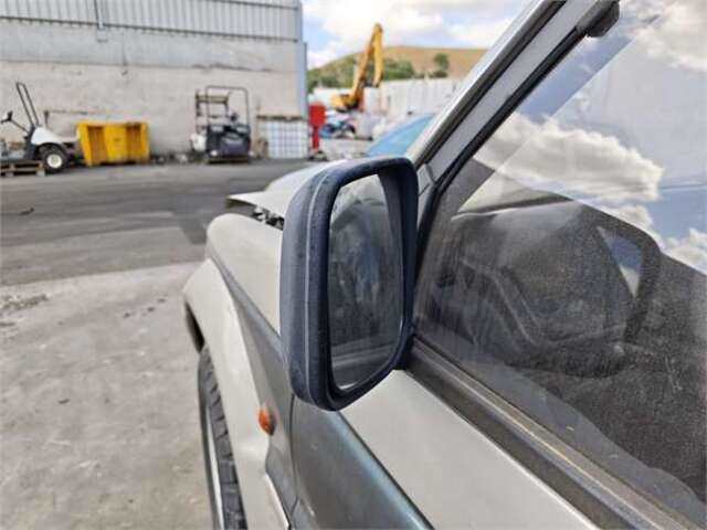 Retrovisor Izquierdo Mitsubishi Montero SIN PAPELES