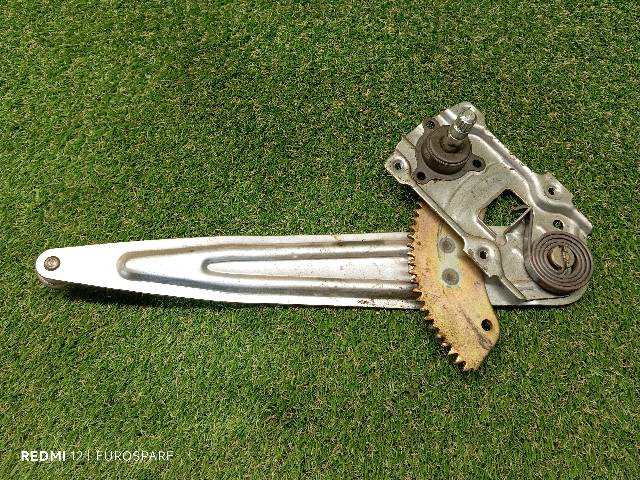 Foto 1ª: Elevalunas Manual Trasero Izquierdo Mitsubishi L200 2.5 D 4P CAJA ABIERTA [4D56] (1999)