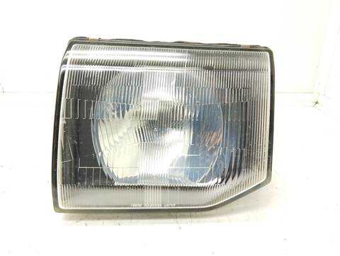 Foto 1ª: Faro Izquierdo Mitsubishi Galloper 2.5 TD CAT 99CV 73KW [4D56] (2002)