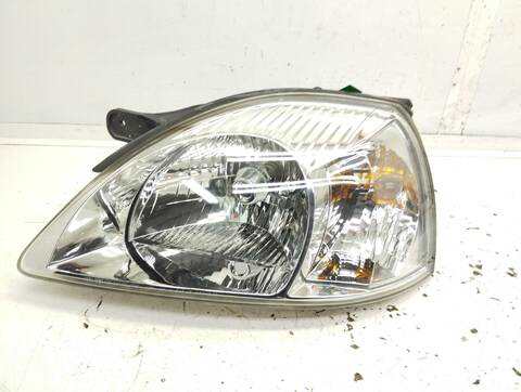 Foto 1ª: Faro Izquierdo Kia Rio 82CV 60KW (2005)