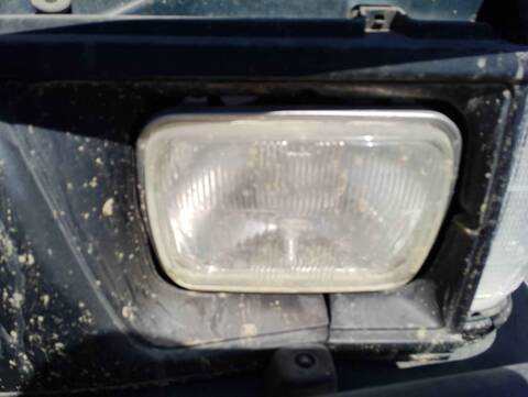 Foto 1ª: Faro Izquierdo Mitsubishi L200 2500 TD 87CV 64KW [4D56] (1996)