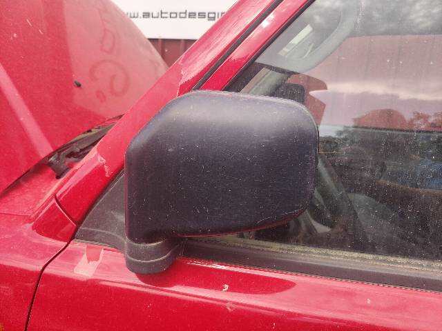 Foto 1ª: Retrovisor Izquierdo Mitsubishi Montero 1.8 GDI 4X4 [4G93] (2000)