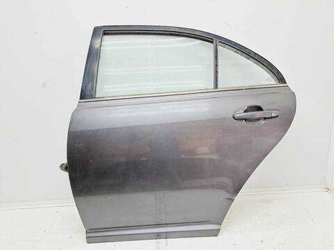 Foto 1ª: Puerta Trasera Izquierda Toyota Avensis 1.8 16V CAT BERLINA 129CV 95KW [1ZZFE] (2005)