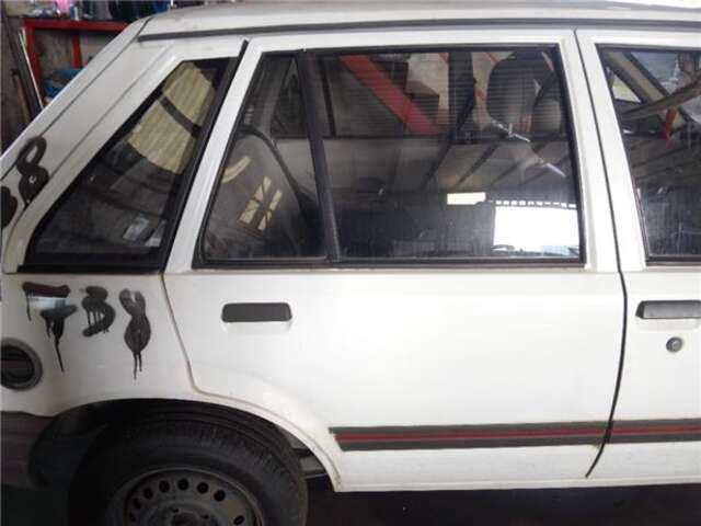 Foto 1ª: Puerta Trasera Derecha Opel Corsa 1.5 D [15 D (4EC1)]